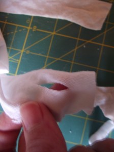 little tiny slits for joining t-shirt yarn